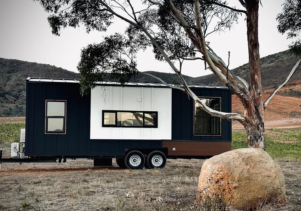 Exterior shot of Clever S Tiny Home on Wheels in a Vineyard