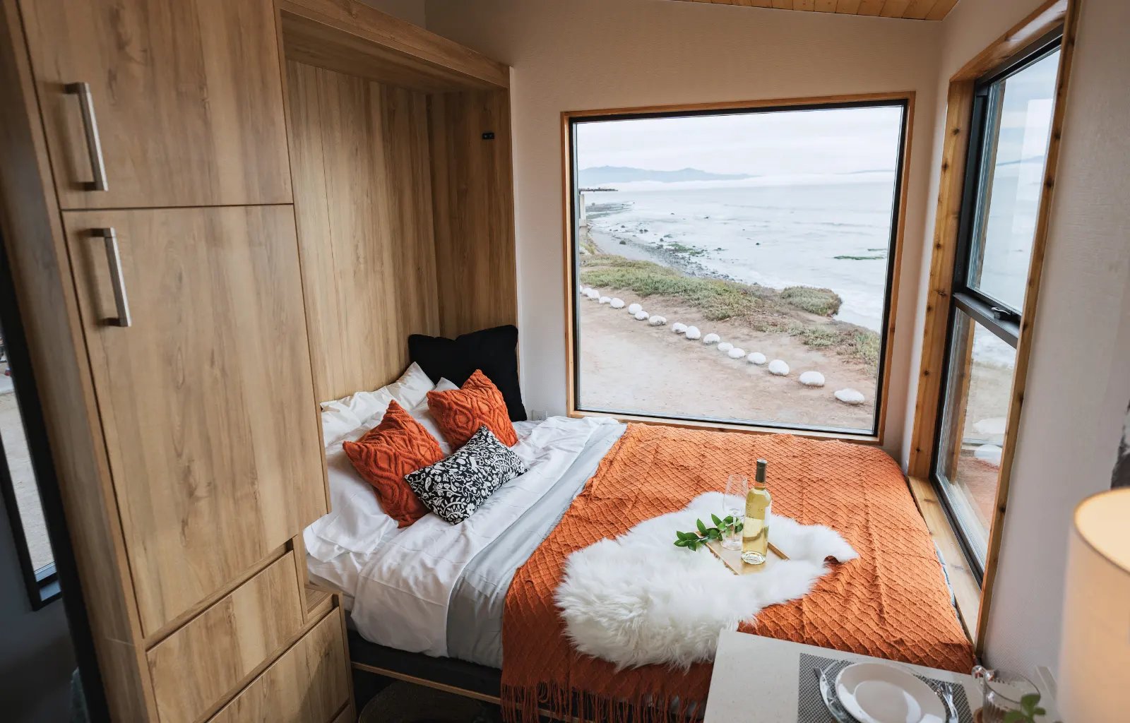 Interior photo of Clever Tiny Home for sale with murphy bed.